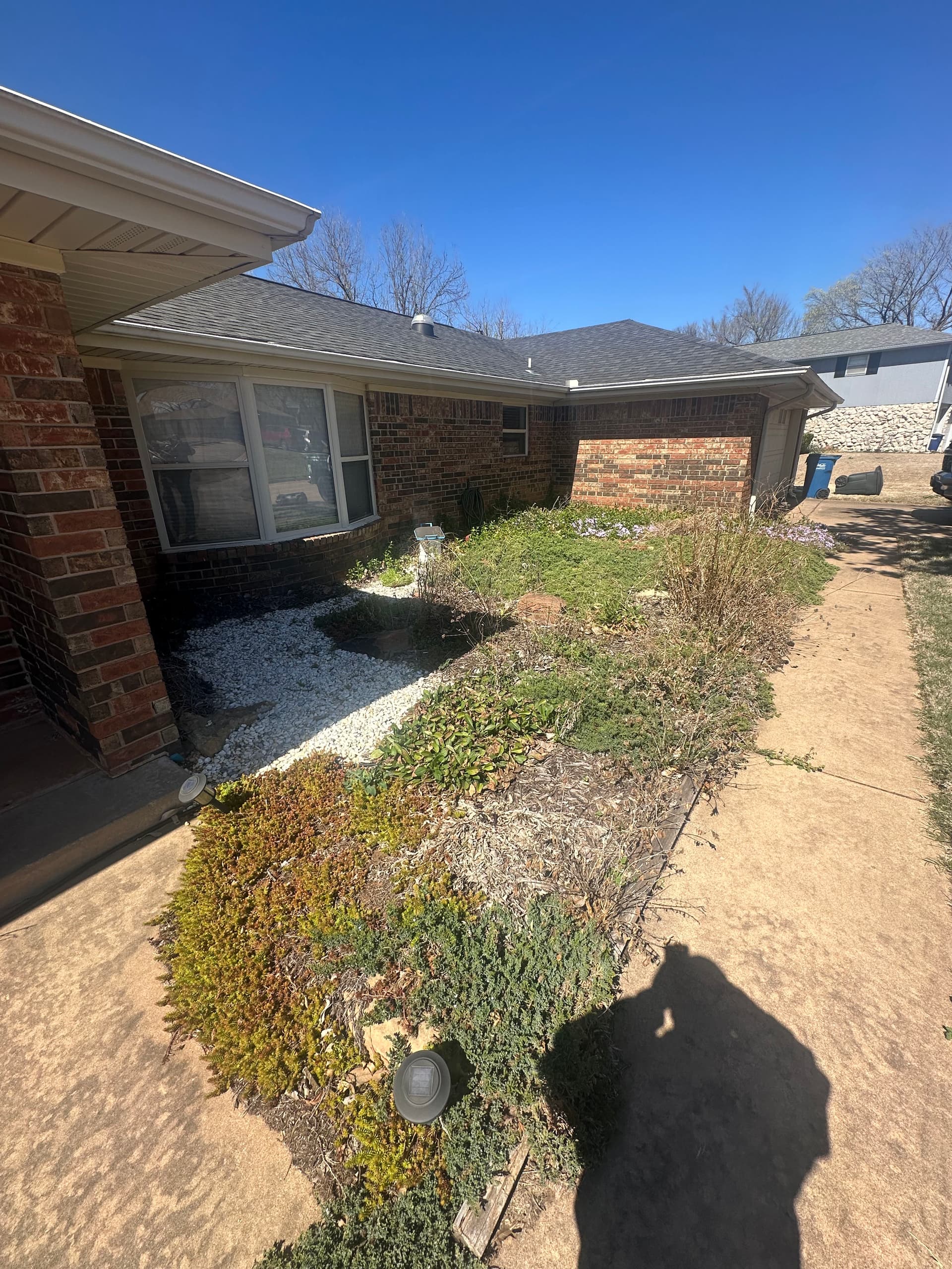 Gallery photos for Overgrown Front Yard Gets a Clean Low-Maintenance Rock Landscape: Image #2