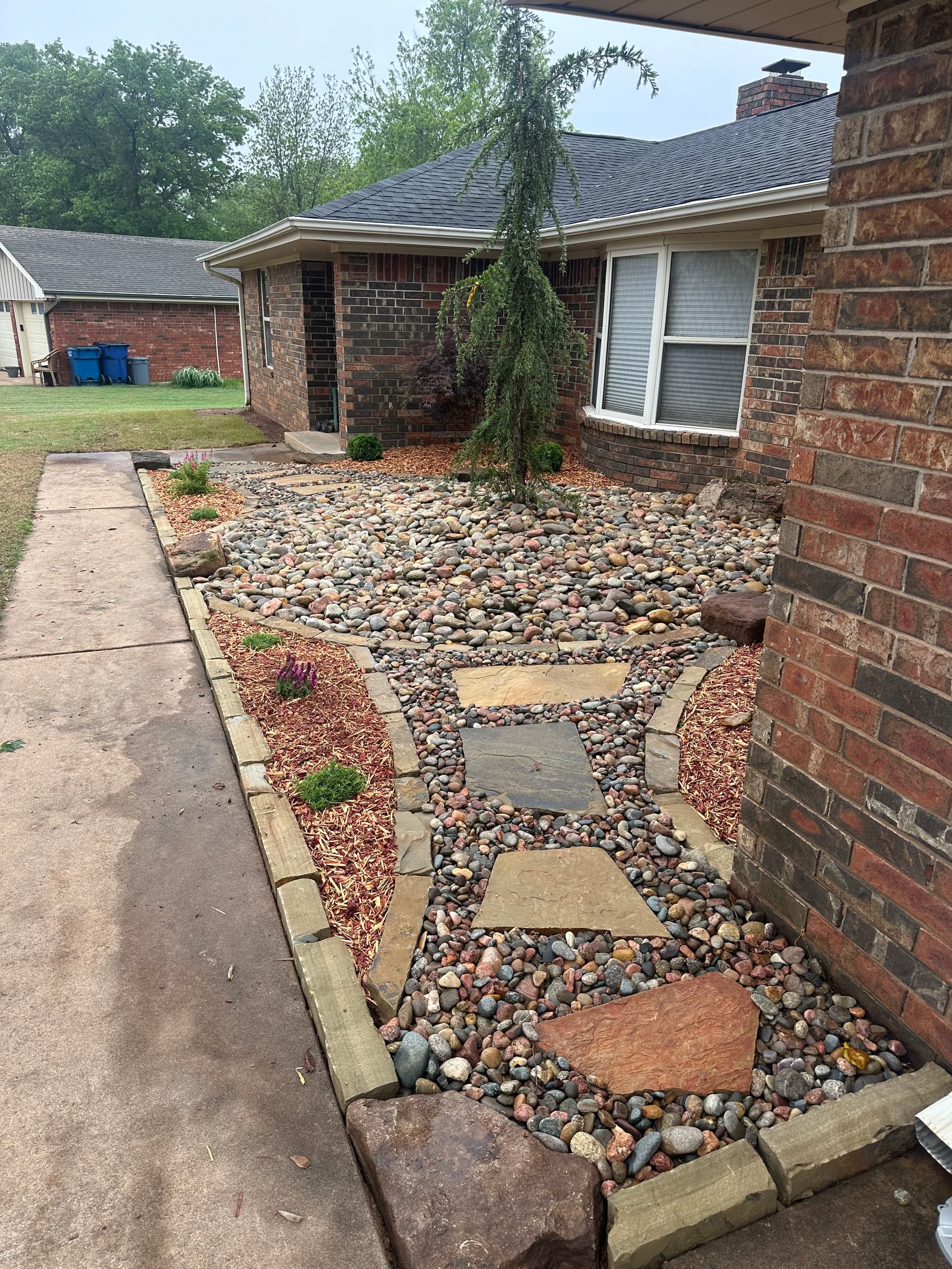 Gallery photos for Overgrown Front Yard Gets a Clean Low-Maintenance Rock Landscape: Image #1