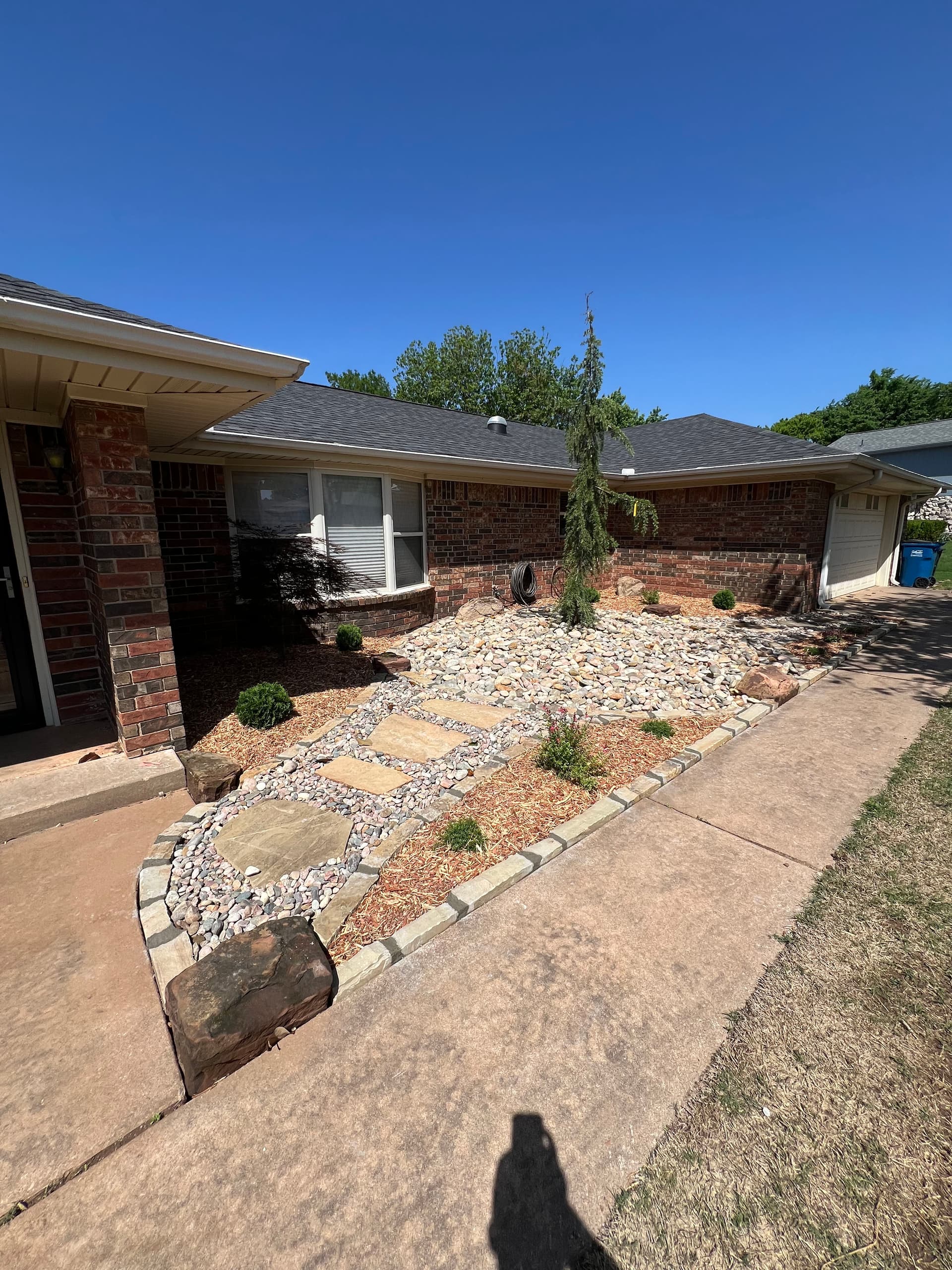 Gallery photos for Overgrown Front Yard Gets a Clean Low-Maintenance Rock Landscape: Image #8