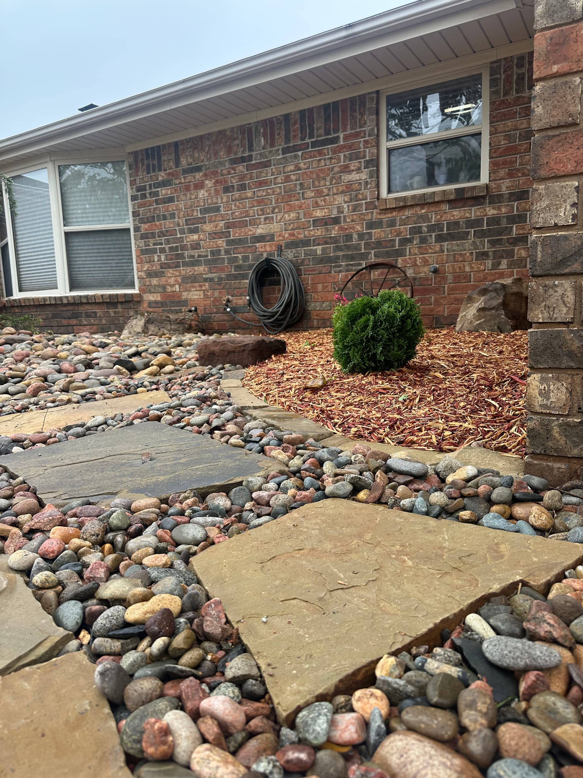 Gallery photos for Overgrown Front Yard Gets a Clean Low-Maintenance Rock Landscape: Image #5