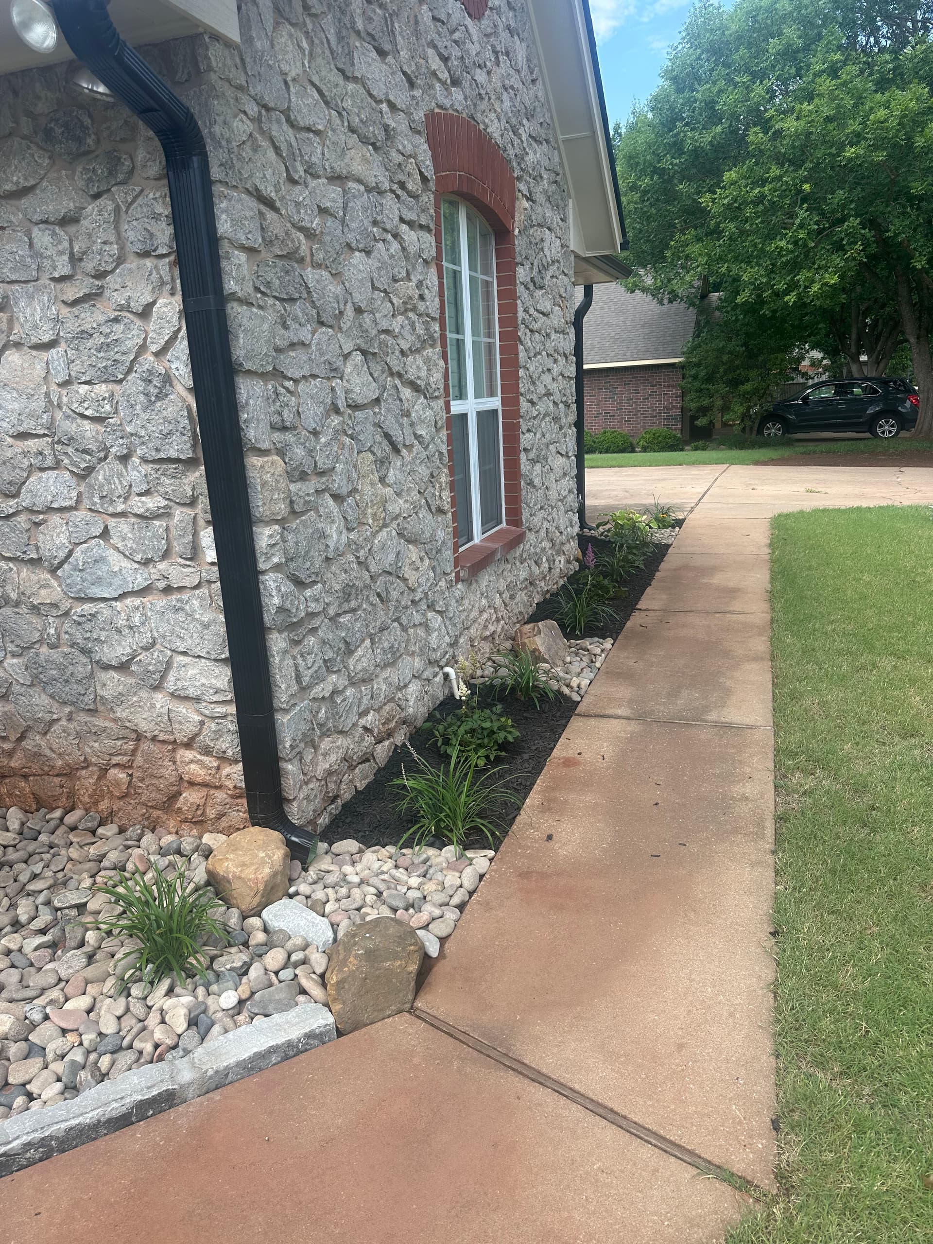 Gallery photos for Native Perennials, Stone Work, and Fescue Sod Give This Yard a Sharp Reset: Image #1