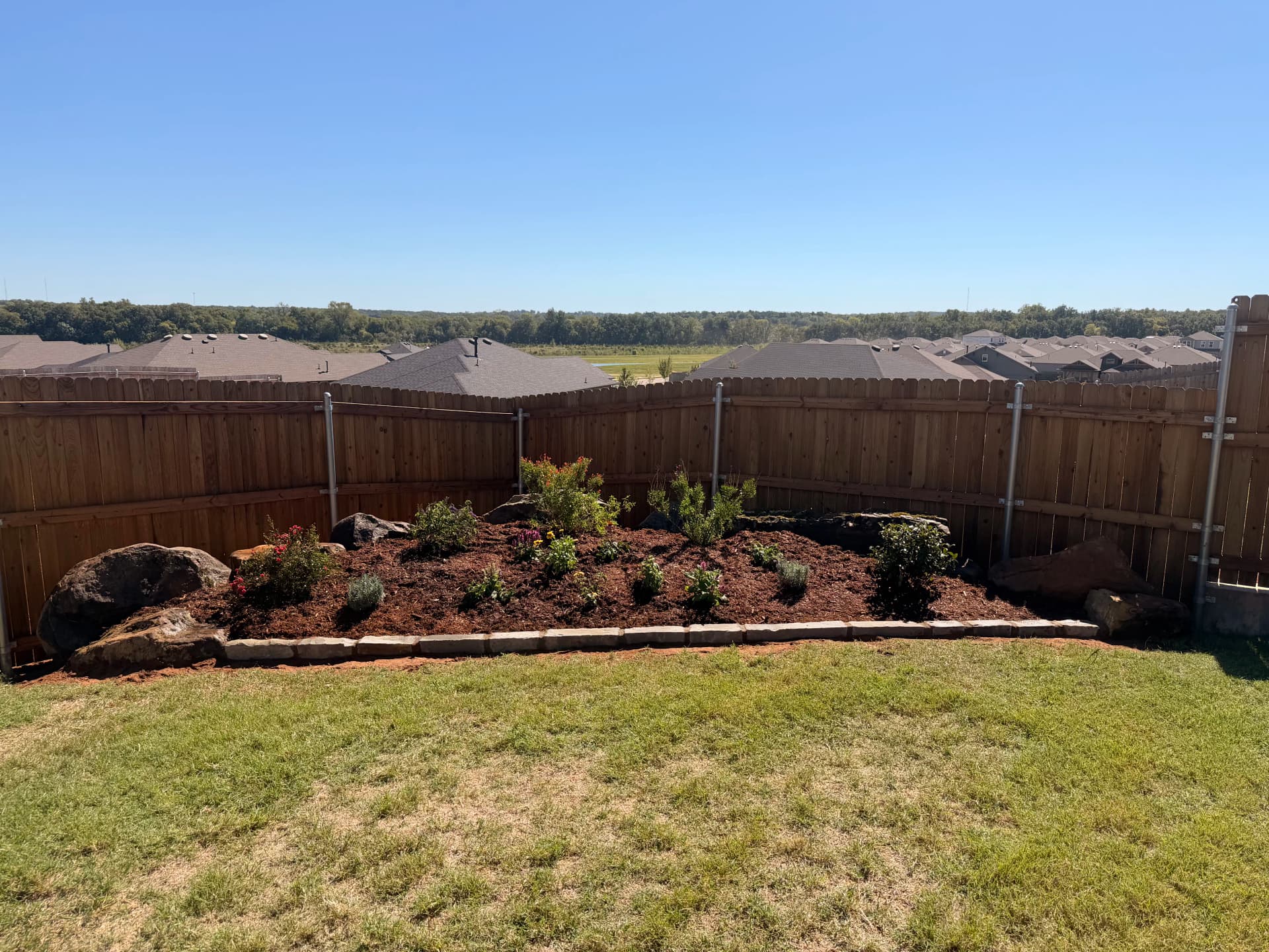 Gallery photos for Boulder Retaining Wall and Oklahoma Native Pollinator Garden Installation: Image #1