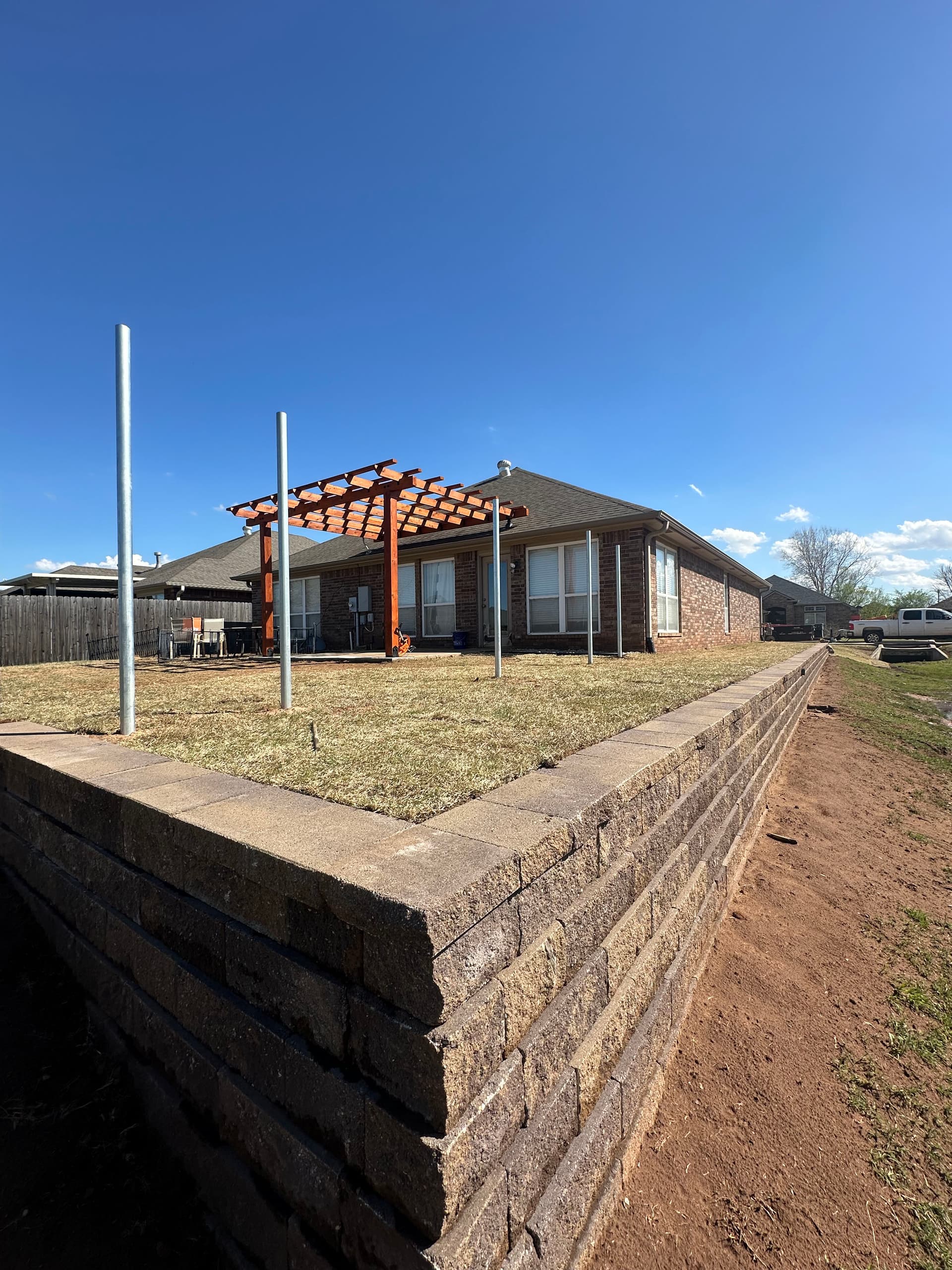Retaining Wall, Cedar Pergola, Walkway and Landscaping in Stillwater OK image