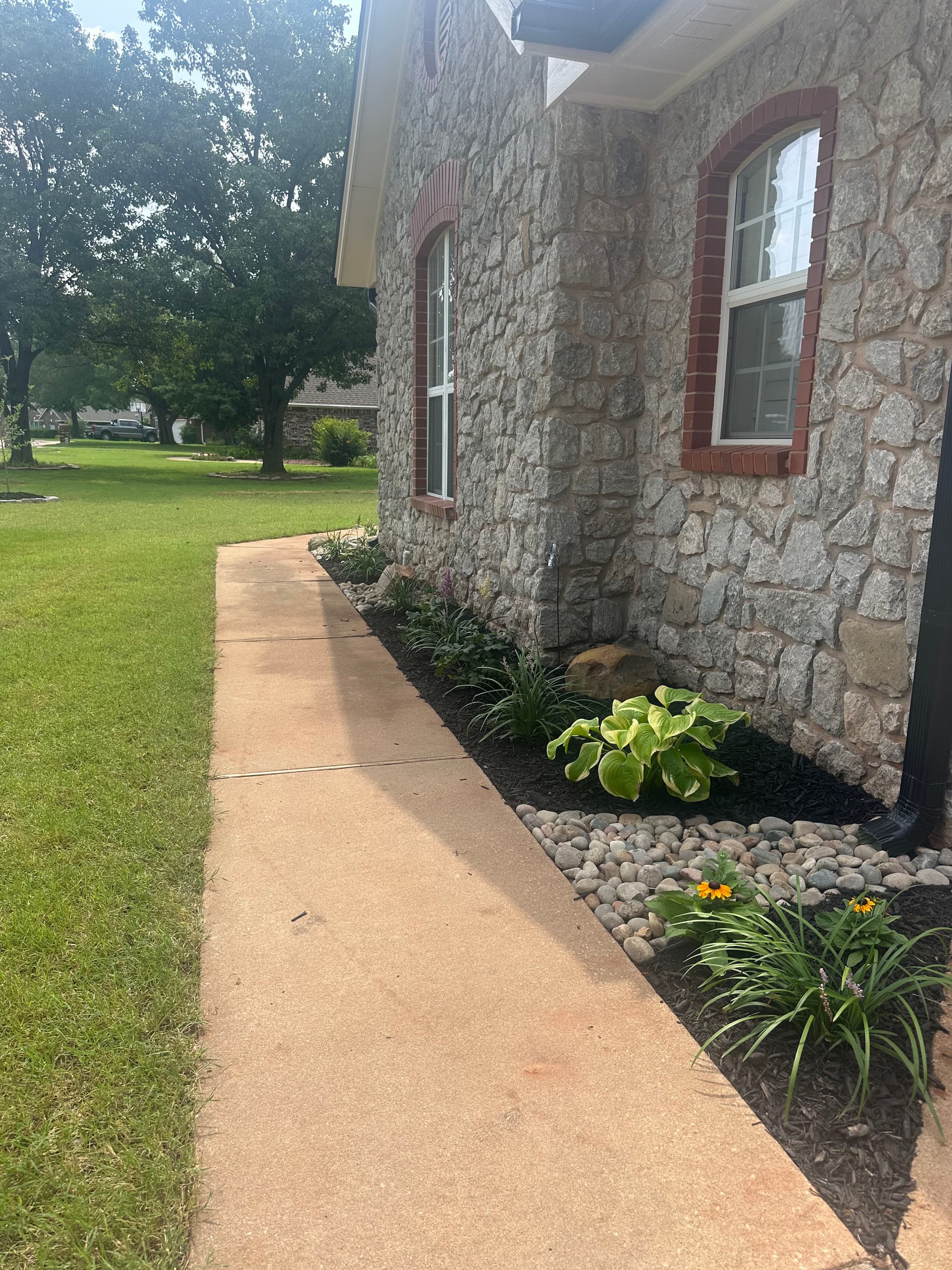 Gallery photos for Native Perennials, Stone Work, and Fescue Sod Give This Yard a Sharp Reset: Image #3